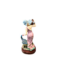 Lady with Peacock Figurine
