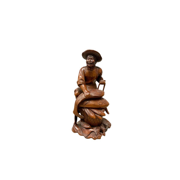 Carved Fisherman Statue