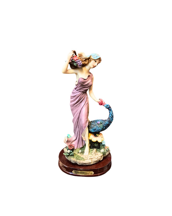 Lady with Peacock Figurine