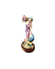Lady with Peacock Figurine